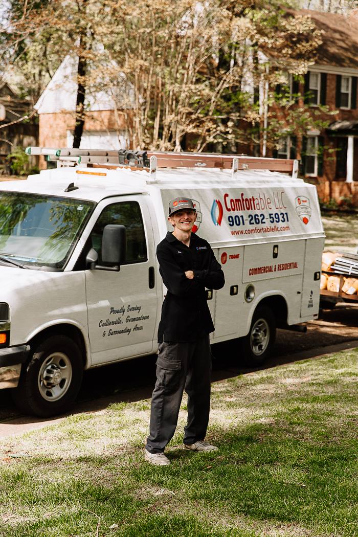 Comfortable LLC technician with service truck